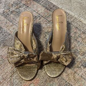 Lulu's Metallic Gold Bow Mules